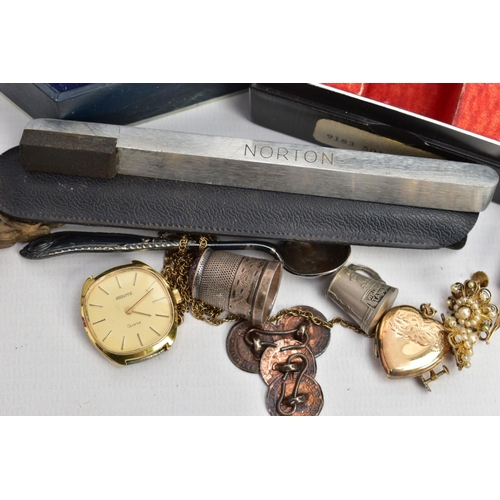 212 - A SELECTION OF ITEMS, to include a 9ct gold front and back heart locket, suspended from a Prince of ... 