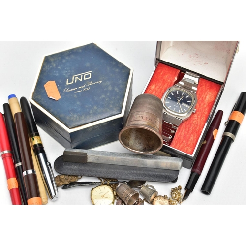 212 - A SELECTION OF ITEMS, to include a 9ct gold front and back heart locket, suspended from a Prince of ... 
