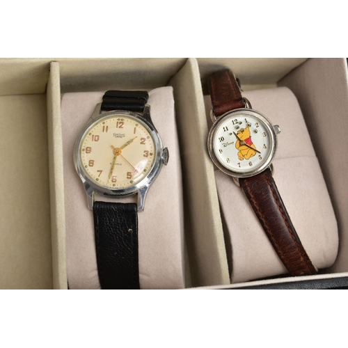 218 - A WATCH DISPLAY CASE WITH ASSORTED WATCHES, a black watch case with twelve assorted watches included... 