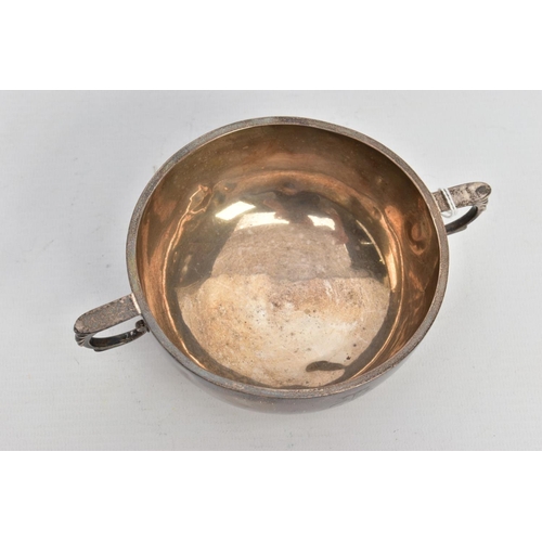226 - A SILVER PORRIDGER, plain polished design with an engraved monogram, fitted with double handles on a... 