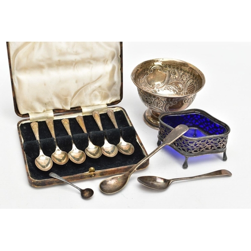 231 - A SELECTION OF SILVER ITEMS, to include a silver embossed bowl with two vacant cartouches, gilt inte... 