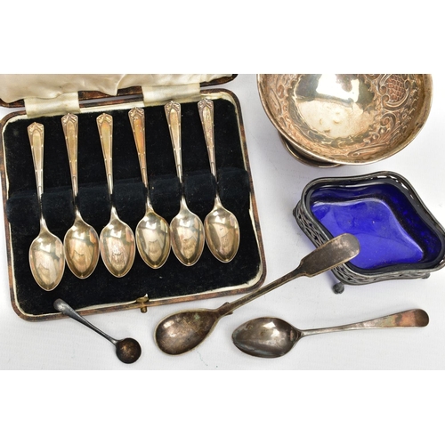 231 - A SELECTION OF SILVER ITEMS, to include a silver embossed bowl with two vacant cartouches, gilt inte... 