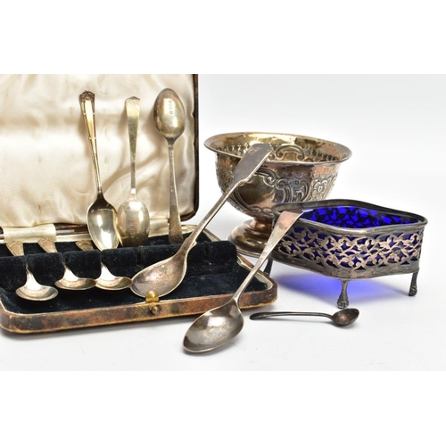 231 - A SELECTION OF SILVER ITEMS, to include a silver embossed bowl with two vacant cartouches, gilt inte... 