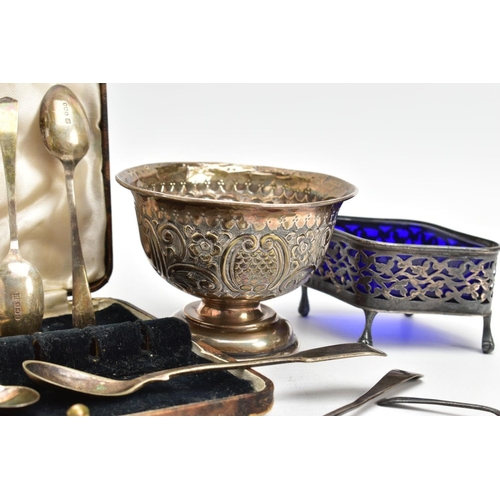 231 - A SELECTION OF SILVER ITEMS, to include a silver embossed bowl with two vacant cartouches, gilt inte... 