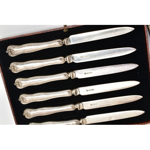 235 - A SELECTION OF SILVER ITEMS, to include a cased set of two concave circular napkin rings, with an en... 