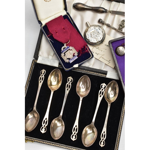 237 - A SELECTION OF SILVER AND WHITE METAL ITEMS, to include a cased set of six teaspoons, with openwork ... 