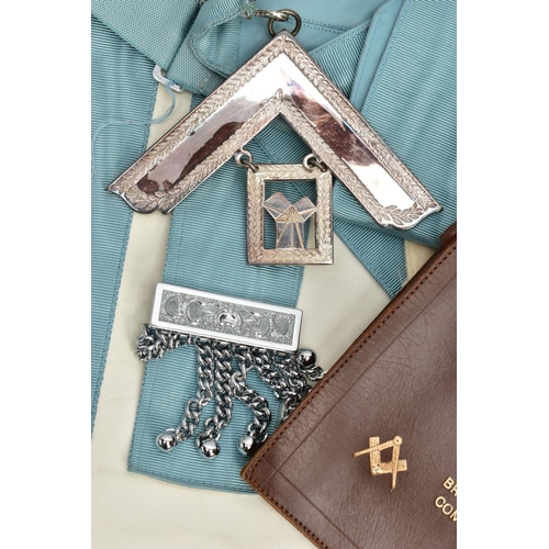 238 - MASONIC REGALIA, to include a light blue and white apron, fitted with white metal tassels, a light b... 
