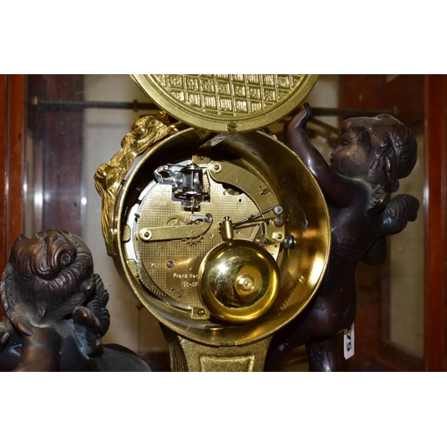 475 - A 20TH CENTURY ITALIAN FIGURAL BRONZE, MARBLE AND BRASS MANTEL CLOCK, Roman numerals, eight day Fran... 