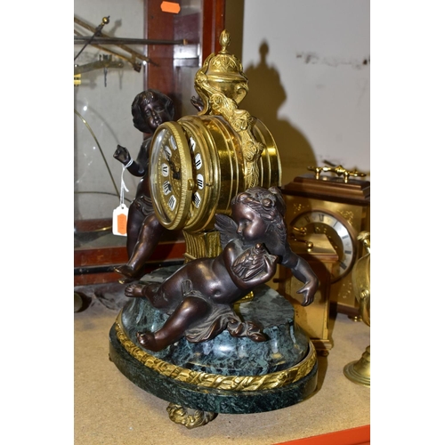 475 - A 20TH CENTURY ITALIAN FIGURAL BRONZE, MARBLE AND BRASS MANTEL CLOCK, Roman numerals, eight day Fran... 
