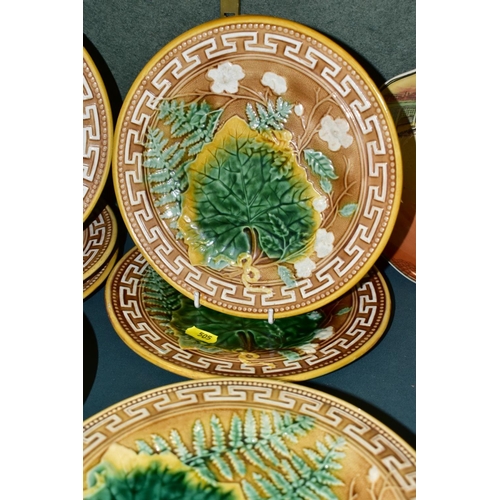 505 - A SEVEN PIECE VICTORIAN MAJOLICA DESSERT SET, comprising a pair of comports and five dessert plates,... 