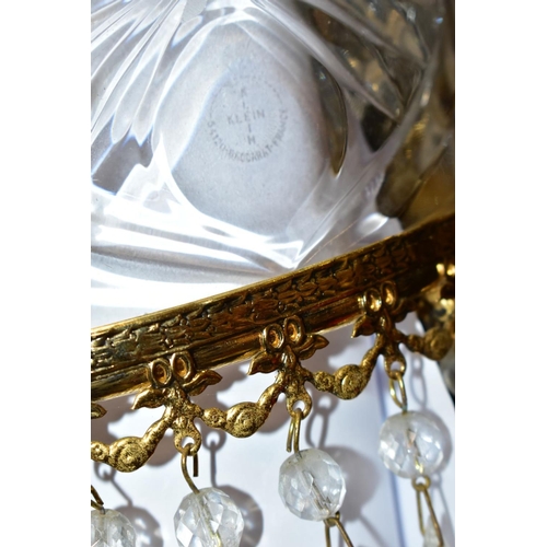 513 - A PAIR OF KLEIN BACCARAT CRYSTAL TABLE LAMPS, with a diamond cut crystal body on a brass base, elong... 