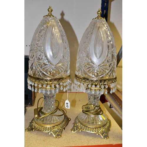 513 - A PAIR OF KLEIN BACCARAT CRYSTAL TABLE LAMPS, with a diamond cut crystal body on a brass base, elong... 