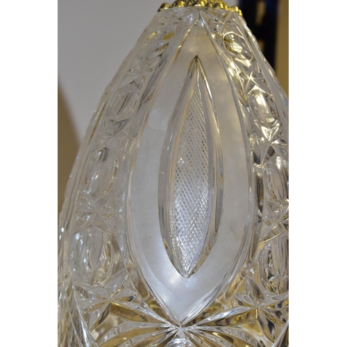 513 - A PAIR OF KLEIN BACCARAT CRYSTAL TABLE LAMPS, with a diamond cut crystal body on a brass base, elong... 