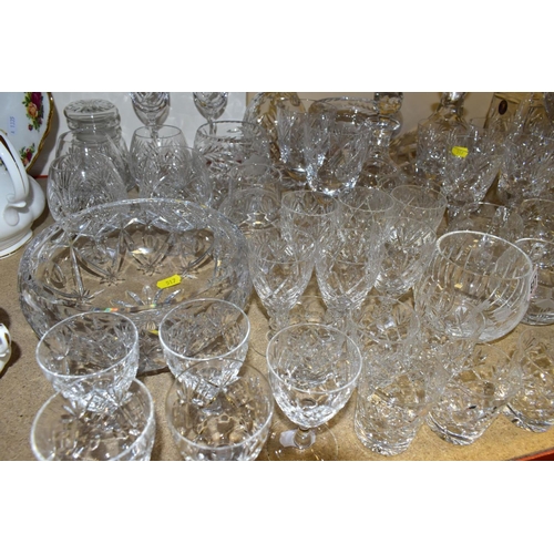 517 - A QUANTITY OF CUT CRYSTAL GLASSWARES, to include approximately fifty five pieces, two mallet shaped ... 