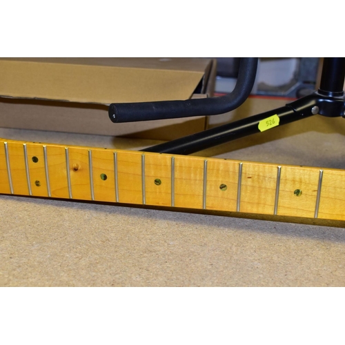 526 - A NEW STRAT STYLE MAPLE NECK with 22 frets, no mounting screw holes so never fitted, along with a St... 