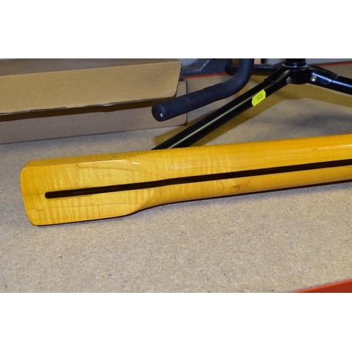 526 - A NEW STRAT STYLE MAPLE NECK with 22 frets, no mounting screw holes so never fitted, along with a St... 