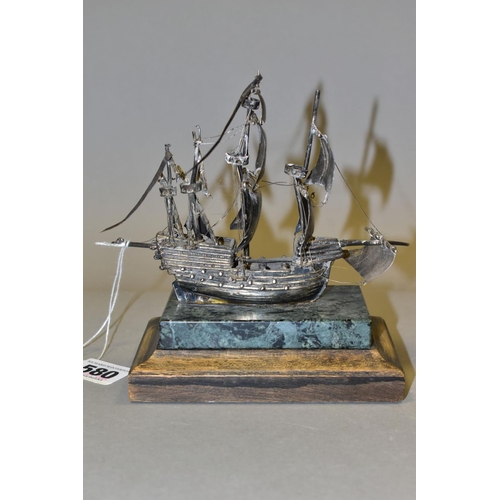580 - A LIMITED EDITION SILVER MODEL OF THE MARY ROSE, mounted on an onyx and mahogany plinth, makers St J... 
