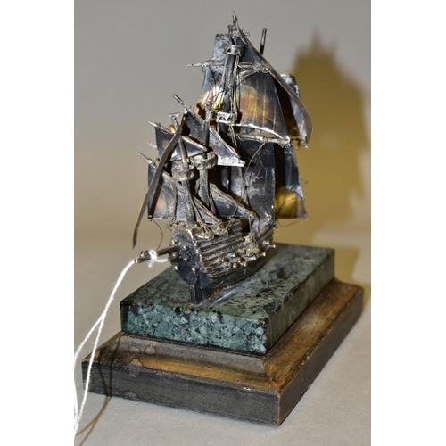 580 - A LIMITED EDITION SILVER MODEL OF THE MARY ROSE, mounted on an onyx and mahogany plinth, makers St J... 