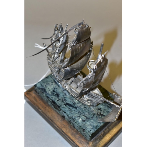 580 - A LIMITED EDITION SILVER MODEL OF THE MARY ROSE, mounted on an onyx and mahogany plinth, makers St J... 