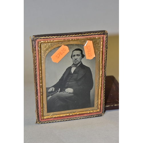 581 - THREE VICTORIAN AMBROTYPES, all three in leather and velvet cases, the largest with split hinge, com... 
