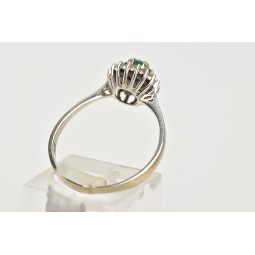 8 - A GREEN CHALCEDONY AND DIAMOND CLUSTER RING, the central circular green chalcedony within a single c... 