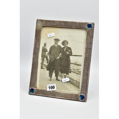 100 - AN ARTS AND CRAFTS SILVER PHOTO FRAME, AF of a rectangular form, plain polished design with three co... 