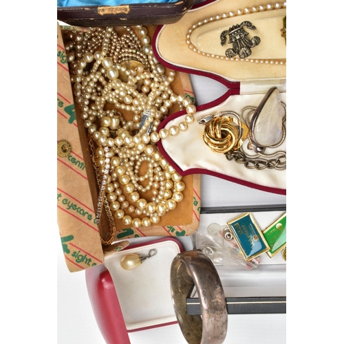 112 - A BOX OF ASSORTED SILVER AND COSTUME JEWELLERY, to include a hinged silver bangle with floral engrav... 