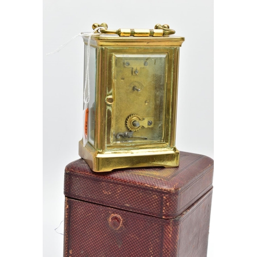 113 - A BRASS CARRIAGE CLOCK WITH CASE, a white dial, roman numerals and blue hands, within a brass and fo... 