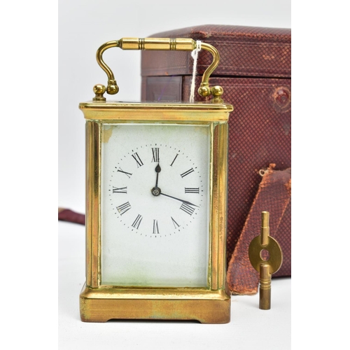 113 - A BRASS CARRIAGE CLOCK WITH CASE, a white dial, roman numerals and blue hands, within a brass and fo... 