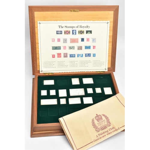 114 - A CASED 'THE STAMPS OF ROYALTY' SILVER STAMP COLLECTION, an incomplete set of silver 'Stamps of Roya... 