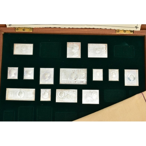 114 - A CASED 'THE STAMPS OF ROYALTY' SILVER STAMP COLLECTION, an incomplete set of silver 'Stamps of Roya... 