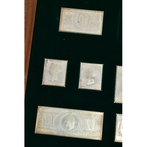 114 - A CASED 'THE STAMPS OF ROYALTY' SILVER STAMP COLLECTION, an incomplete set of silver 'Stamps of Roya... 