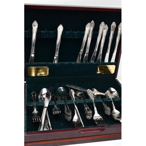 125 - TWO CUTLERY CANTEENS, to include a Royal Rose canteen, incomplete set with additional cutlery added,... 