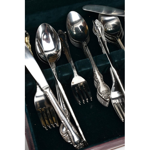 125 - TWO CUTLERY CANTEENS, to include a Royal Rose canteen, incomplete set with additional cutlery added,... 