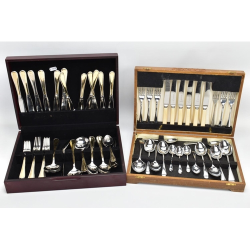 126 - TWO WOODEN CANTEENS OF CUTLERY, to include a complete set of white metal cutlery with yellow metal d... 