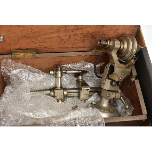 134 - TWO BOXES OF WATCH MAKERS TOOLS AND EQUPIMENTS, to include a cased 'Seitz' pusher press with attachm... 