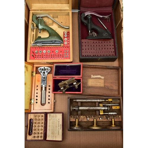 134 - TWO BOXES OF WATCH MAKERS TOOLS AND EQUPIMENTS, to include a cased 'Seitz' pusher press with attachm... 