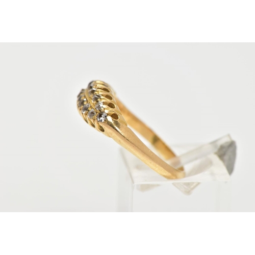 14 - AN 18CT GOLD DIAMOND BOAT RING, a yellow gold ring set with sixteen old cut diamonds, leading onto a... 