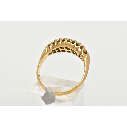 14 - AN 18CT GOLD DIAMOND BOAT RING, a yellow gold ring set with sixteen old cut diamonds, leading onto a... 