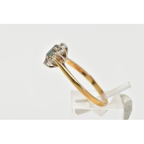 146 - AN 18CT GOLD GEM SET CLUSTER RING, of an oval form, centring on an oval cut aquamarine, within a sur... 