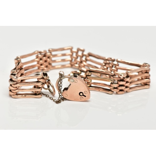 15 - A 9CT ROSE GOLD GATE BRACELET,  a four row rose gold gate bracelet (solder marks to some of the link... 