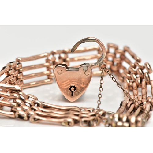 15 - A 9CT ROSE GOLD GATE BRACELET,  a four row rose gold gate bracelet (solder marks to some of the link... 