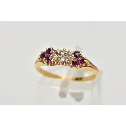 153 - A DIAMOND AND RUBY RING,  six old cut diamonds prong set in yellow metal, accented with three circul... 