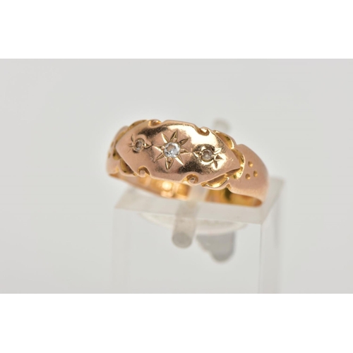 154 - A 15CT GOLD VICTORIAN DIAMOND RING, three old cut  diamonds in a starburst setting with scrolling de... 