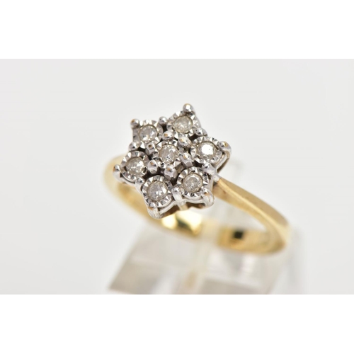 160 - A 9CT GOLD DIAMOND CLUSTER RING, seven round brilliant cut diamonds in a white gold illusion setting... 