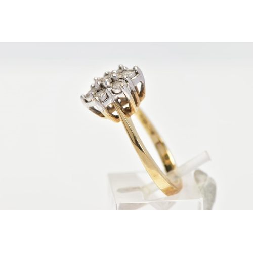 160 - A 9CT GOLD DIAMOND CLUSTER RING, seven round brilliant cut diamonds in a white gold illusion setting... 