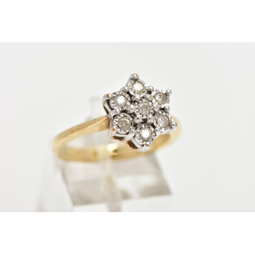 160 - A 9CT GOLD DIAMOND CLUSTER RING, seven round brilliant cut diamonds in a white gold illusion setting... 