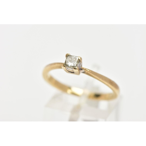 163 - A YELLOW METAL SINGLE STONE DIAMOND RING, four claw set princess cut diamond, stamped diamond weight... 