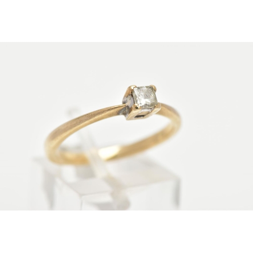 163 - A YELLOW METAL SINGLE STONE DIAMOND RING, four claw set princess cut diamond, stamped diamond weight... 