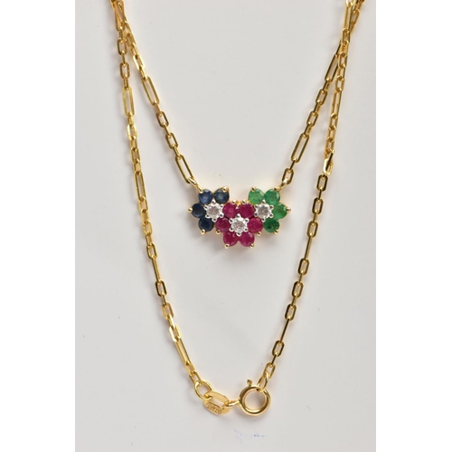 165 - A YELLOW METAL GEMSTONE PENDANT NECKLACE, the pendant in the form of three flowers, with rubies, sap... 